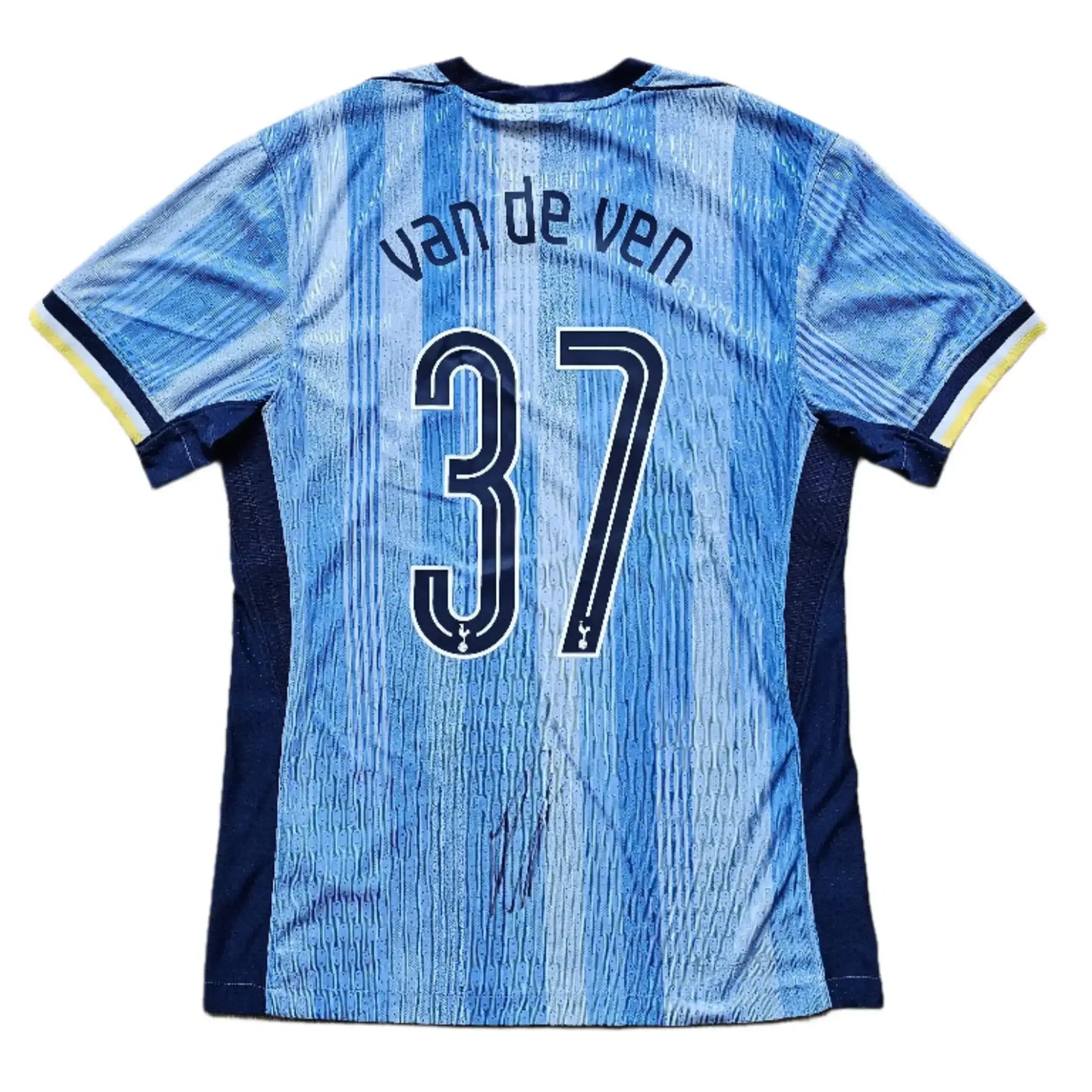 Back view showing van de ven and No. 37 on a blue Tottenham football shirt with signature.