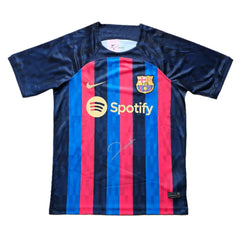 Front view featuring Barcelona crest, Spotify sponsor, and Joan Laporta's signature.