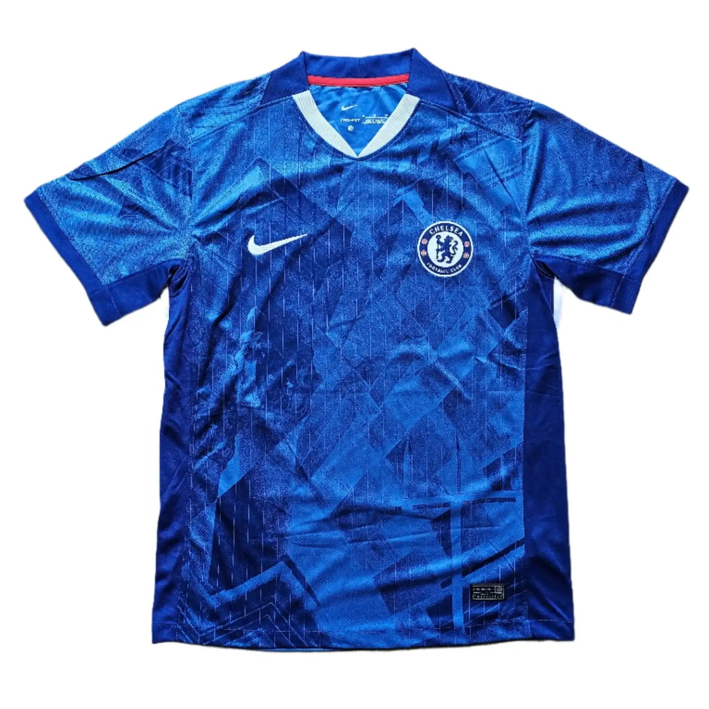 Front view of signed football shirt featuring Chelsea crest and Nike logo in blue.