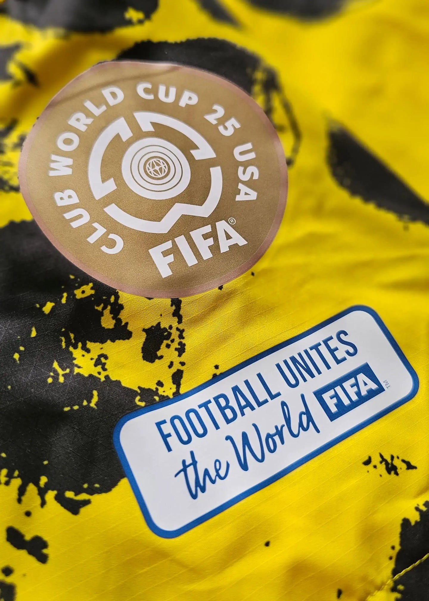Detail view featuring FIFA Club World Cup 25 USA logo and Football Unites the World label.