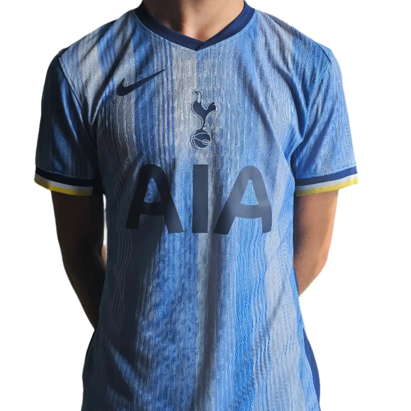 Back view of Micky van de Ven's signed football shirt featuring No. 37 and Tottenham crest.