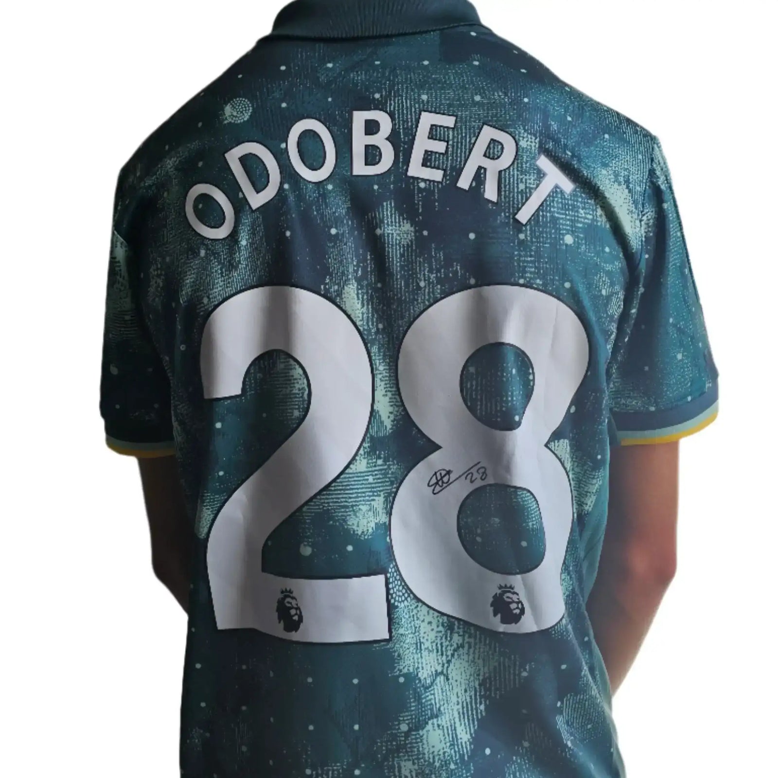 Back view showing Odobert, No. 28, and signature on Tottenham signed football shirt.