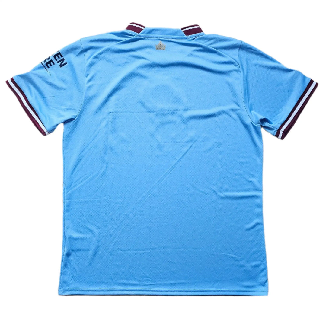 Light blue sports jersey with red and white accents on a white background