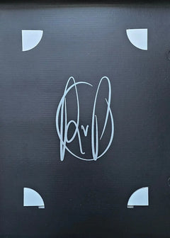 Signature of Robin van Persie on a black background with corners showing.
