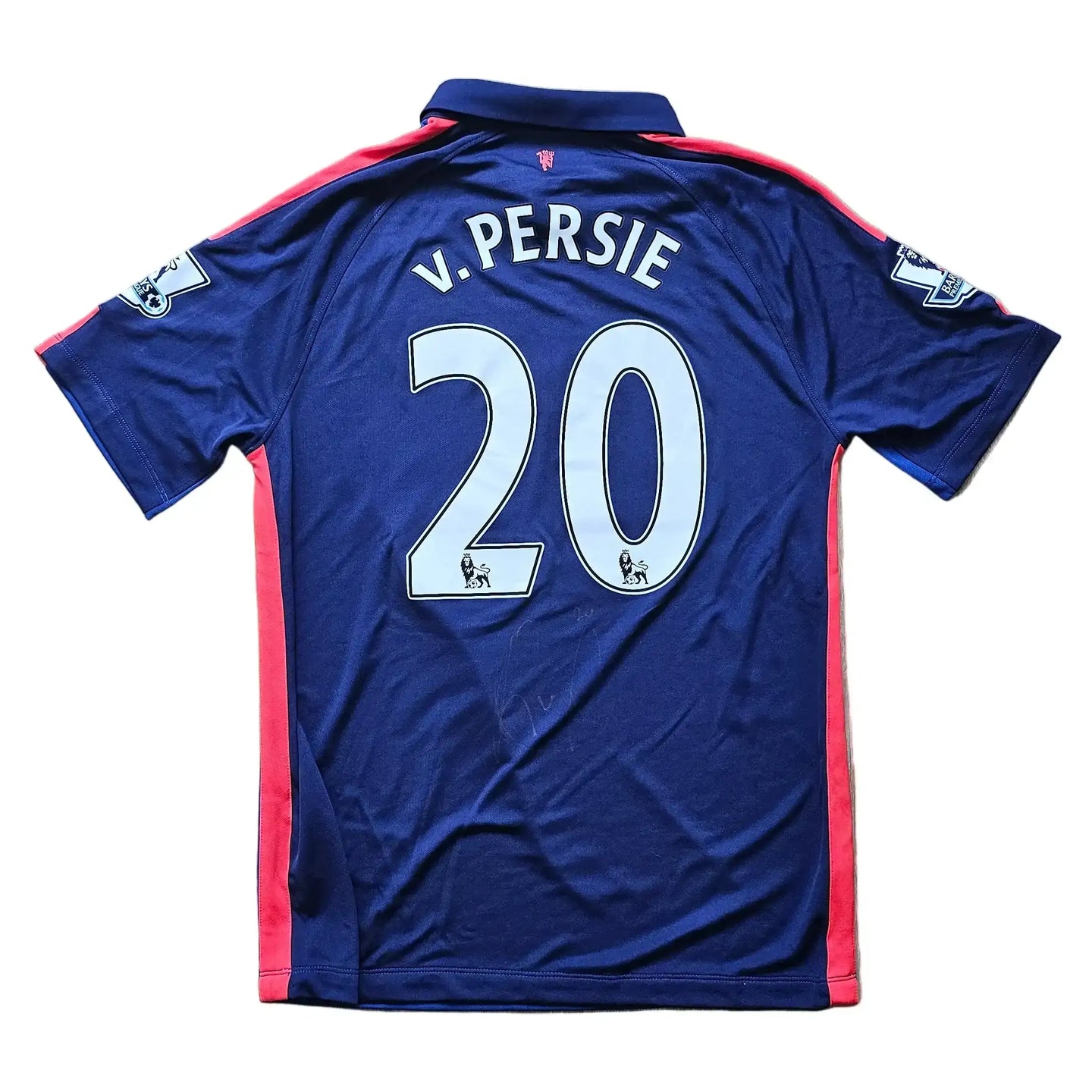 Back view of a signed Manchester United shirt with 'V. PERSIE' and '20' in light blue.