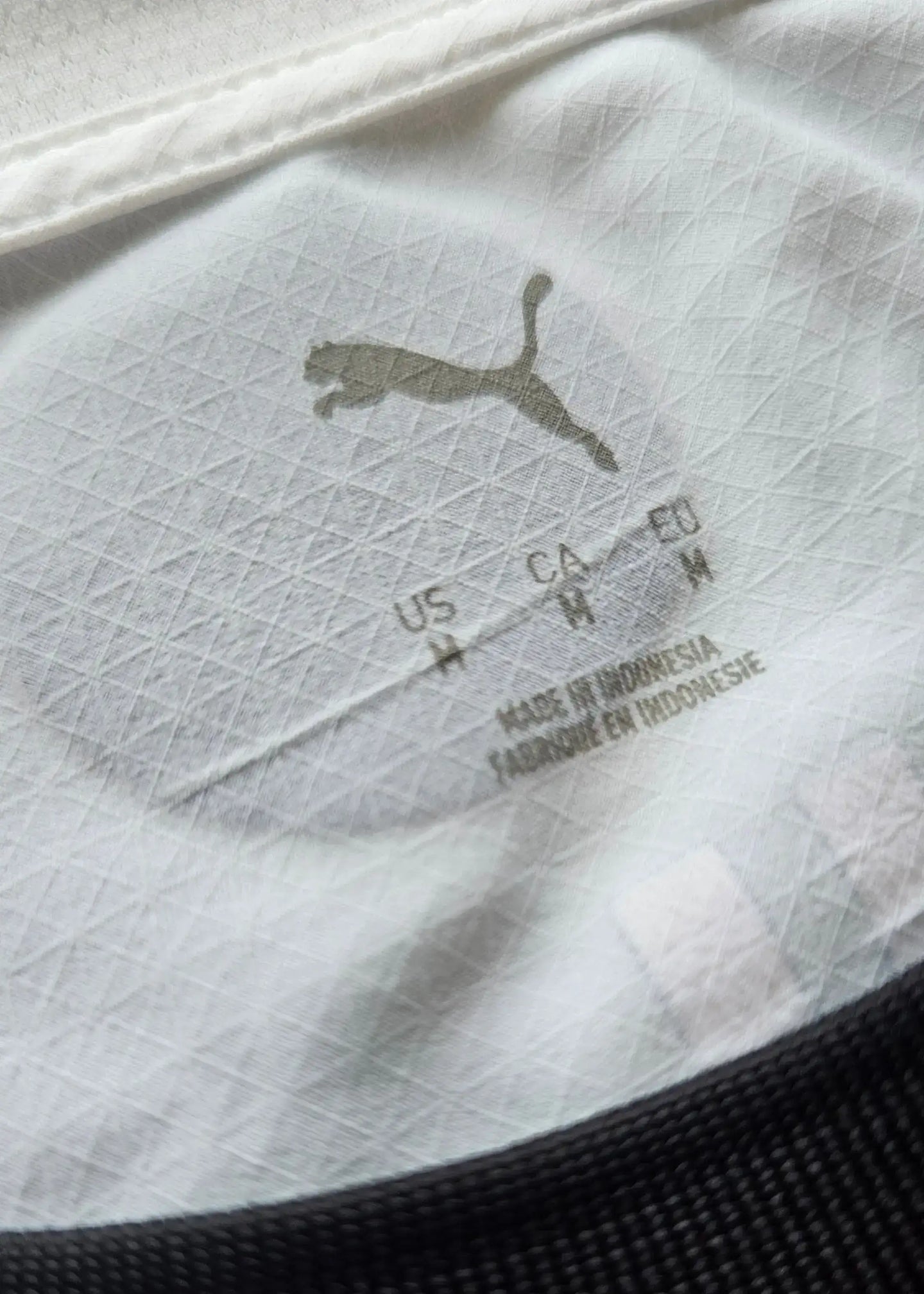 Puma logo and size details: US H, CA H, EU M, made in Indonesia.