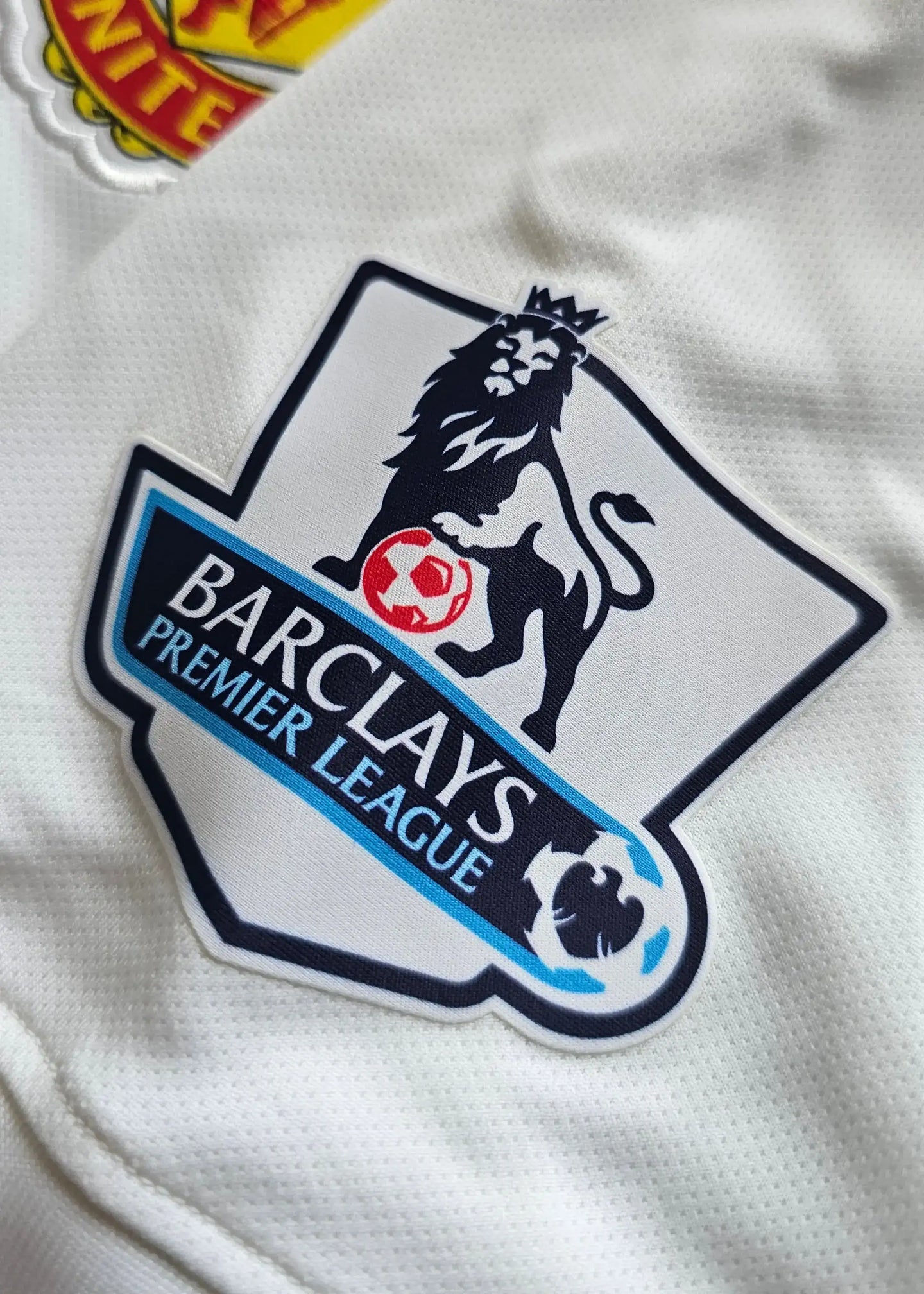 Close-up of the Barclays Premier League crest featuring a lion and the text 'BARCLAYS PREMIER LEAGUE.'