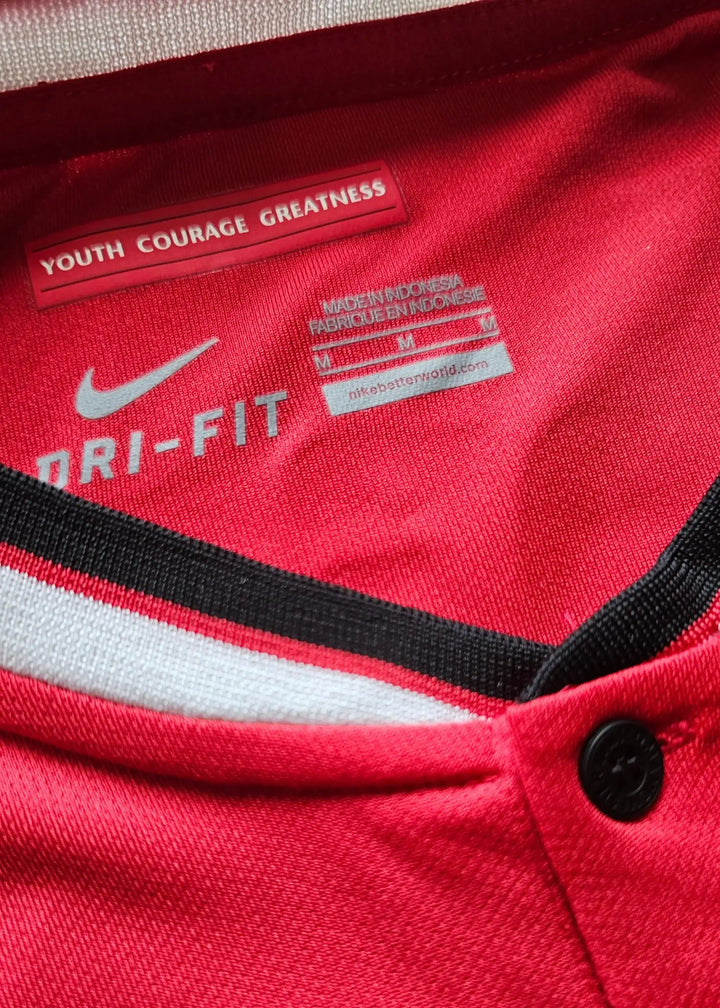 Red Nike Dri-FIT shirt with label &