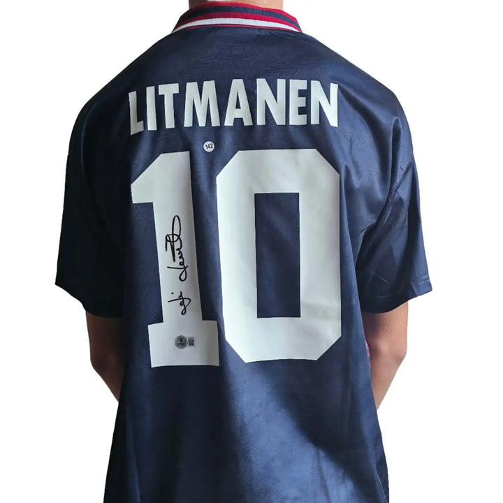 Back view featuring Litmanen 10 and a visible signature on a dark shirt.