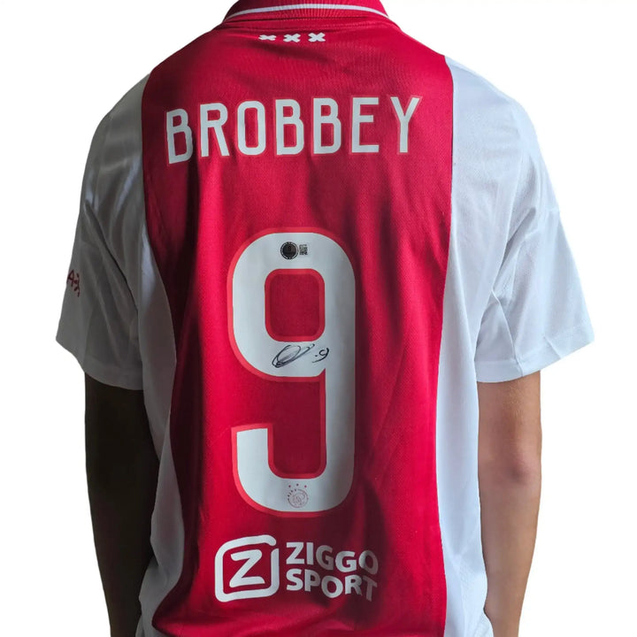 Back view showing Brobbey, No. 9, signature detail, and Ziggo Sport sponsor.