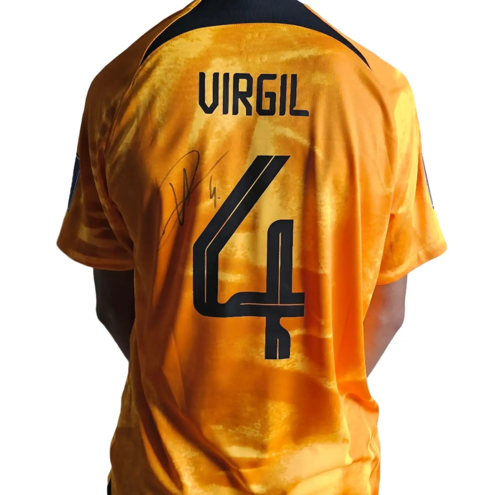 Back view showcasing player name VIRGIL, No. 4, and signature on orange football shirt.
