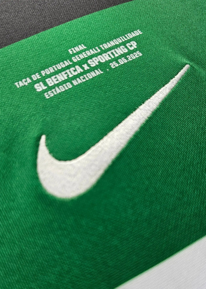 Nike logo and tournament details for SL Benfica vs Sporting CP match on green fabric.