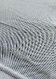 Close-up showing 'AEROREADY' text on fabric of Sjaak Swart Ajax signed shirt.