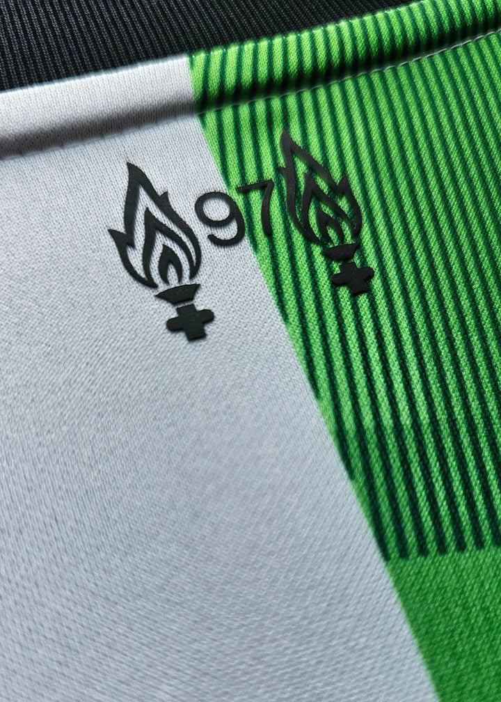 Detail view featuring two flames and the number 18 on the shirt.