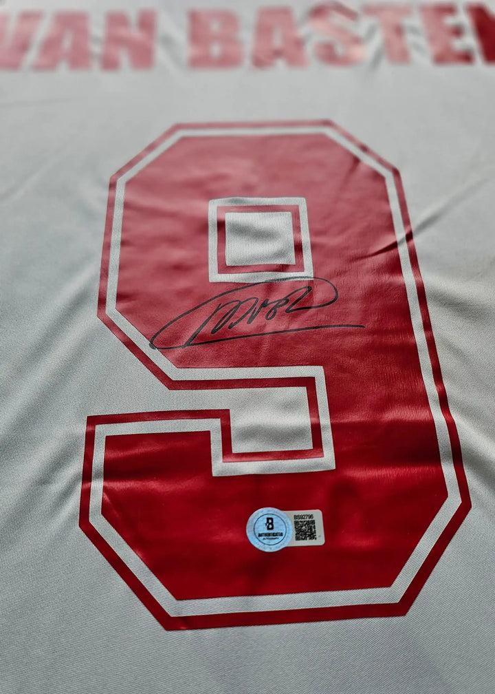 Detail view showing No. 9, signature, and name &