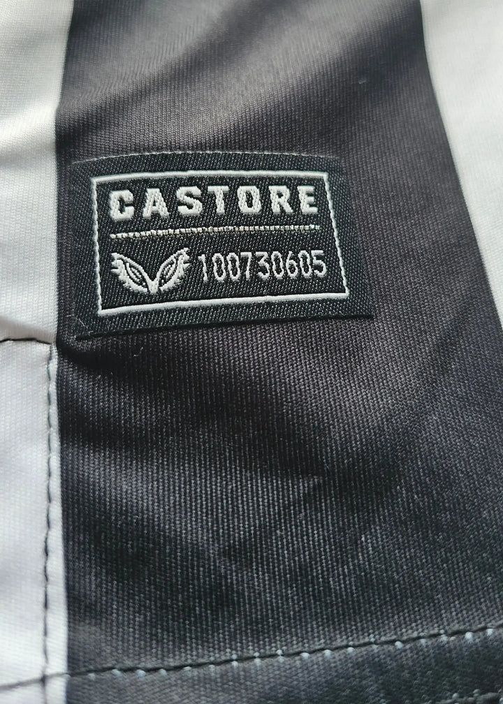 Castore brand label stitched into the fabric with the number 100730605.