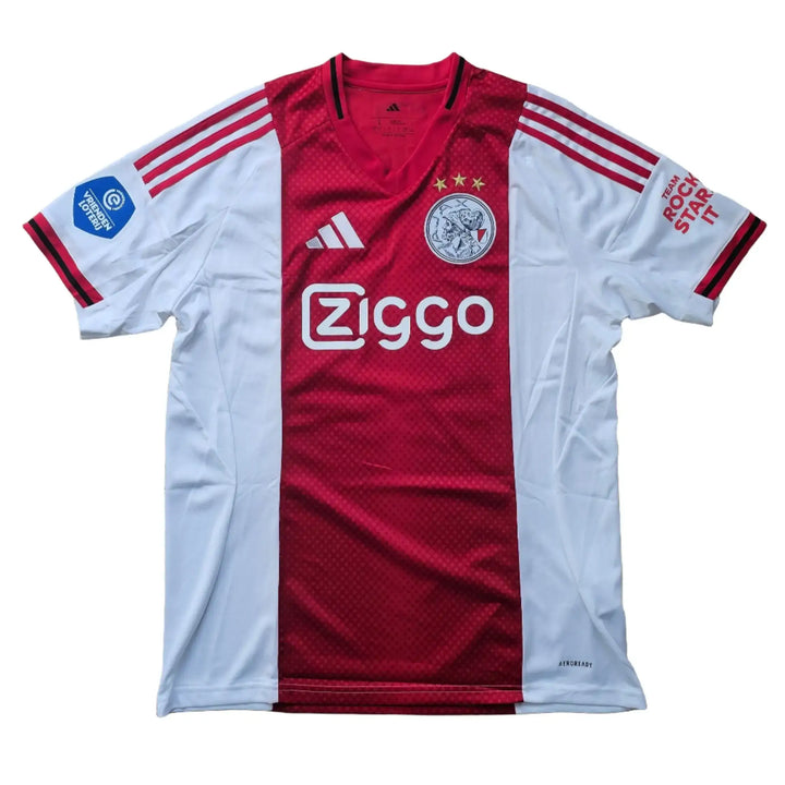 Frontal view of Wout Weghorst signed football shirt displaying Ziggo and three stars on the crest.