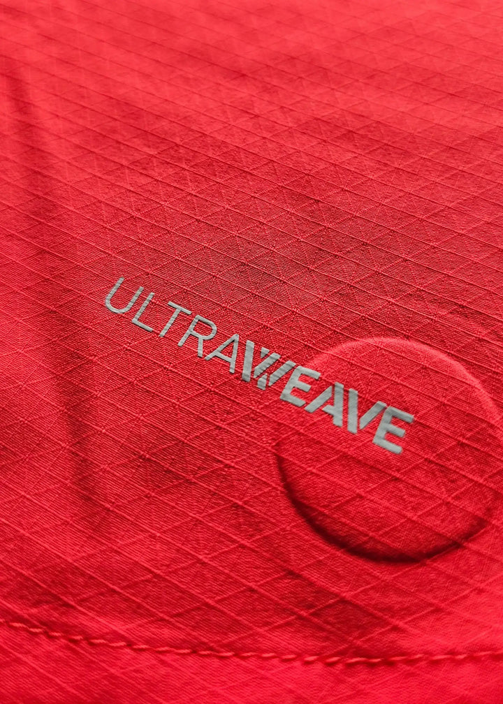 Close-up of red fabric displaying the text &