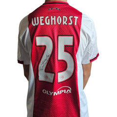 Ajax football shirt featuring Weghorst, No. 25, with a visible signature and OLYMPIA text.