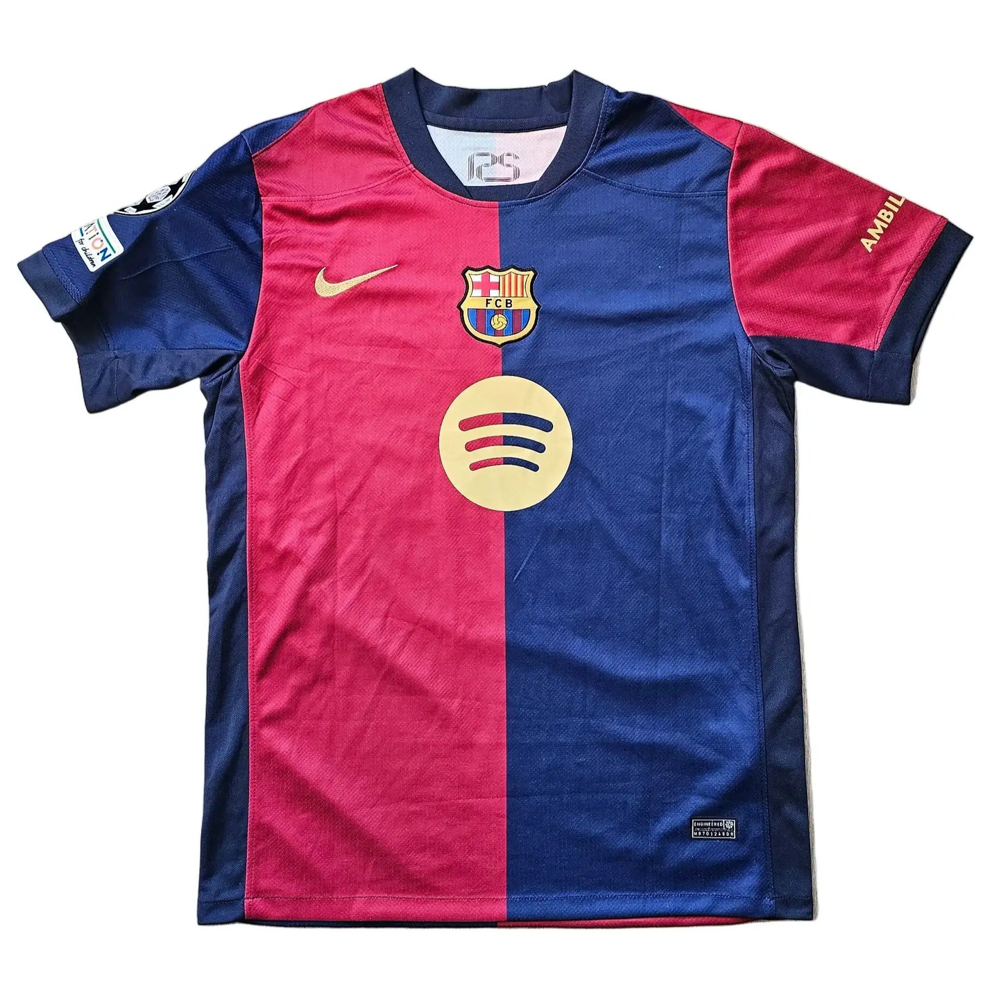 Barcelona football shirt in blue and red with crest, Nike logo, and Spotify sponsor detail.