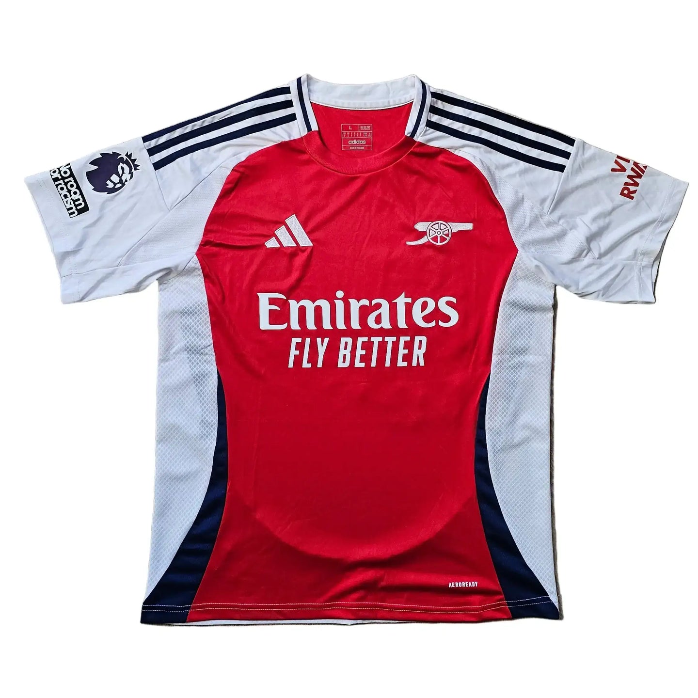 Ethan Nwaneri signed Arsenal shirt, red and white with Emirates sponsor and adidas logo.