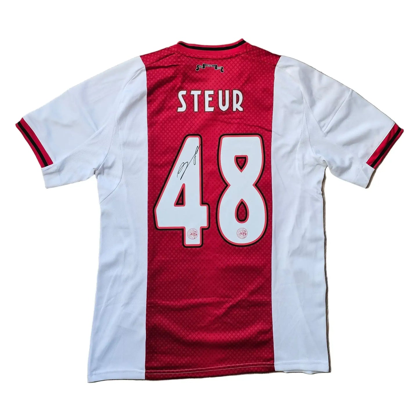 Back of Ajax shirt showing Steur, No. 48, with a visible signature beneath the number.
