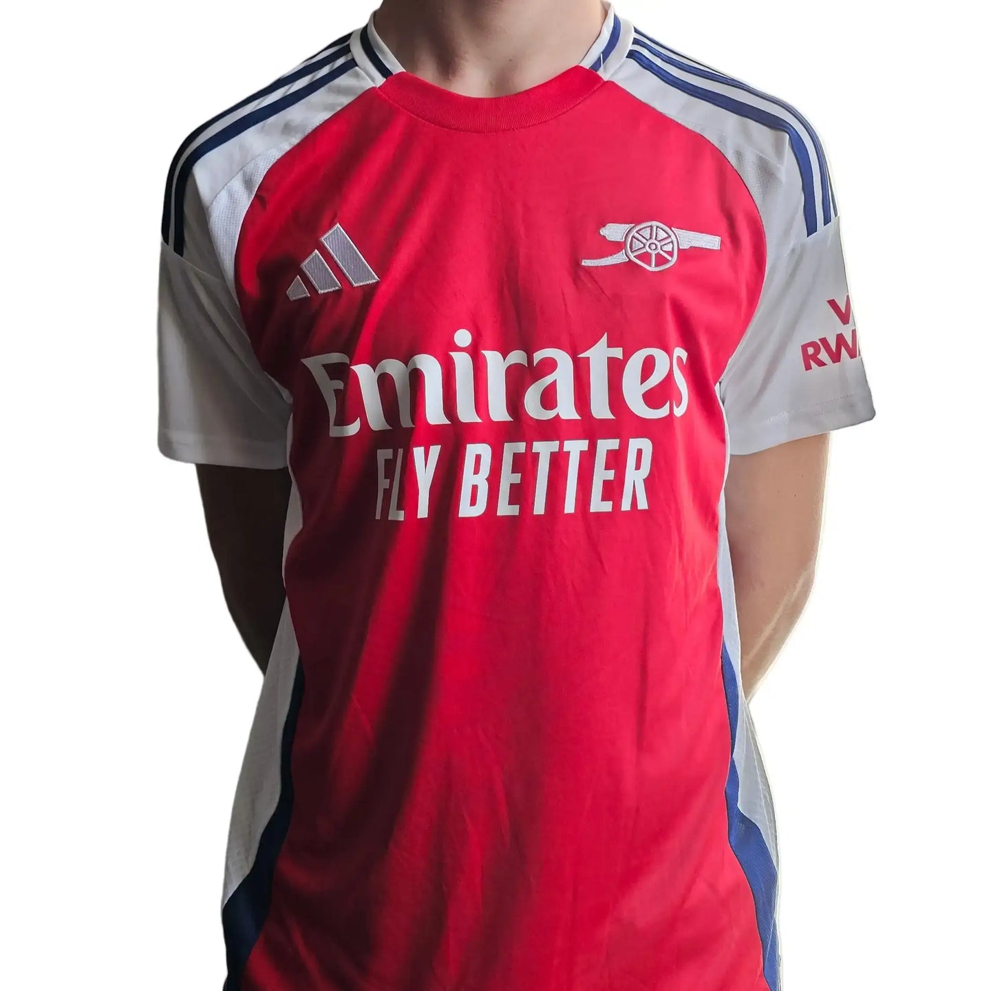 Red and white Arsenal shirt featuring 'Emirates Fly Better' sponsor and number 10.