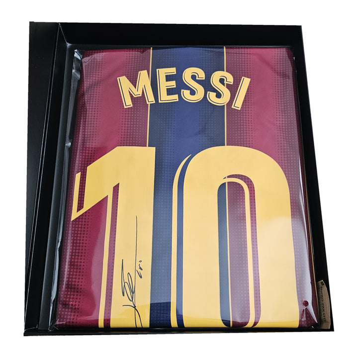 Messi's signed Barcelona 2020-21 shirt in its box tray, MESSI nameset and number 10 with his black-marker signature.