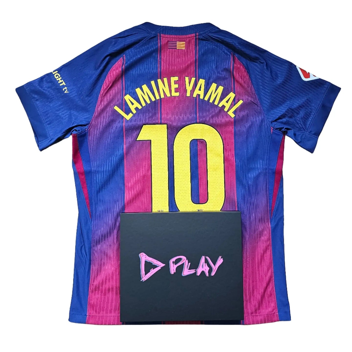 Back view displaying No. 10 and Lamine Yamal on a blue and red football shirt with D PLAY logo.