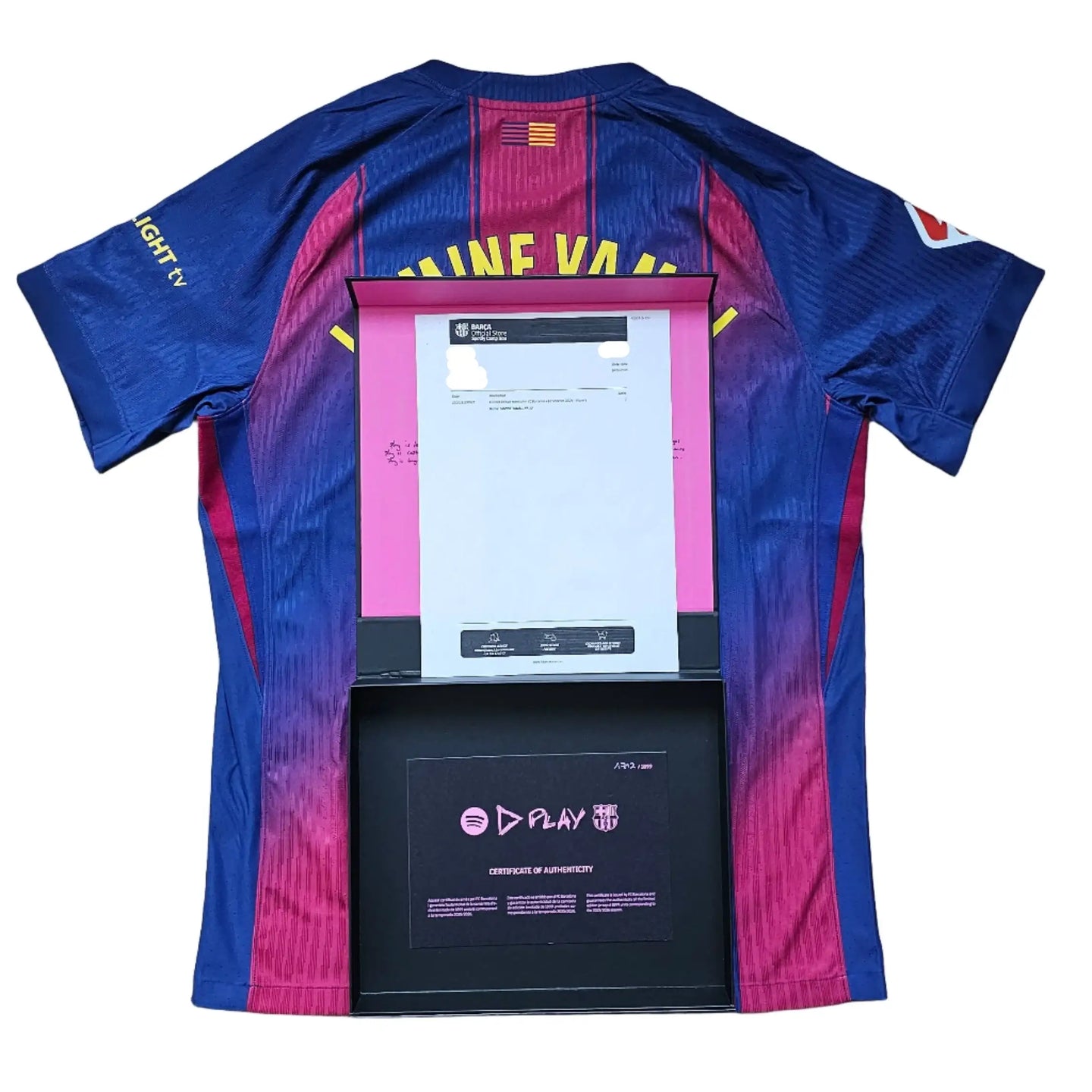 Back view displaying Lamine Yamal name and authenticity certificate details with FC Barcelona crest.