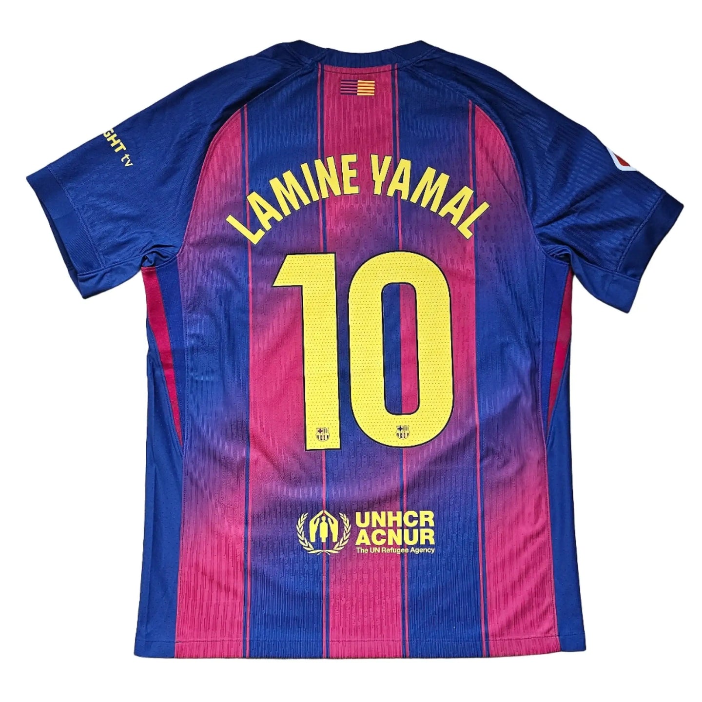 Back view featuring Lamine Yamal, No. 10, and UNHCR ACNUR logo on the football shirt.