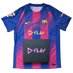 Back view showing the No. 10, FC Barcelona crest, and 'D PLAY' logo in bright colors.