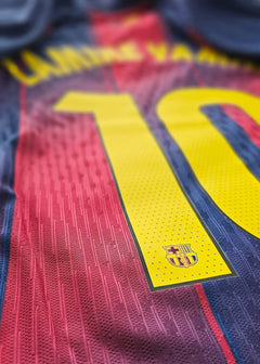 Close-up of Barcelona No. 10 with Lamine Yamal's name and the club crest.