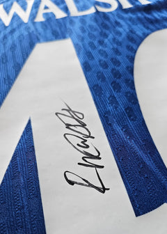 Detail showing signature of Walsh on blue Chelsea football shirt No. 46.