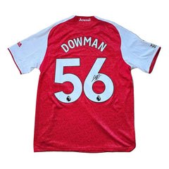 Back view showing the name DOWMAN and No. 56, with a visible signature.