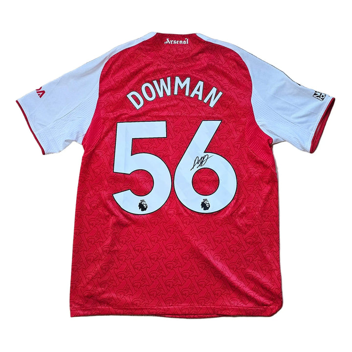 Back view showing the name DOWMAN and No. 56, with a visible signature.