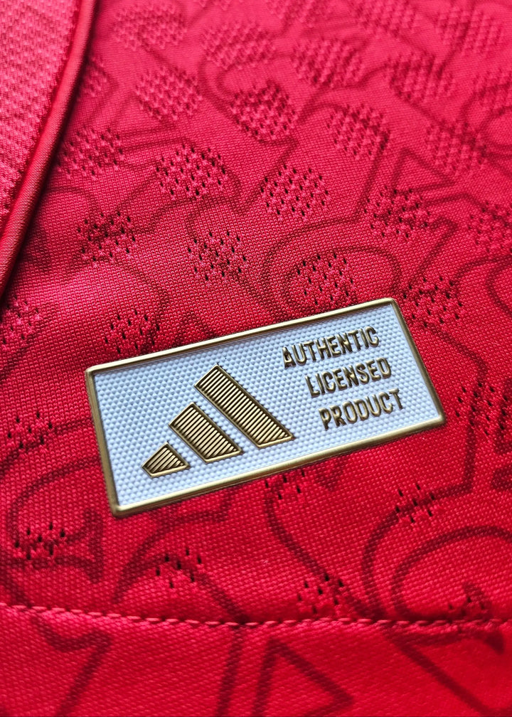 Detail showing adidas logo with text &