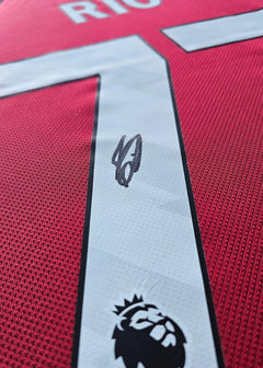 Close-up of the signature on Rio Ngumoha's No. 73 Liverpool F.C. football shirt.