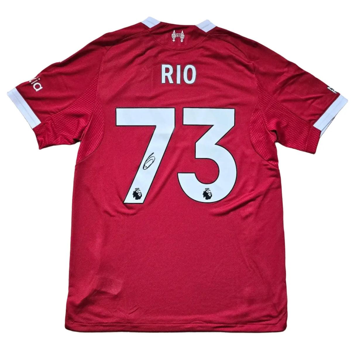Back view showing Rio and No. 73, with a visible signature near the number.