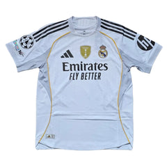 Back view showing Real Madrid crest, adidas branding, and 'Emirates FLY BETTER' text.