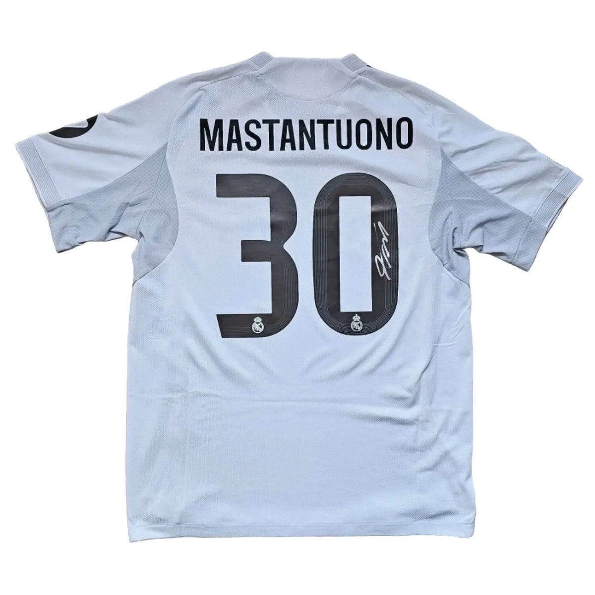 Back view featuring player name Mastantuono, No. 30, and visible signature.