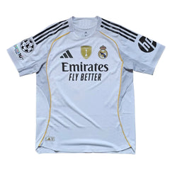 Back view featuring Real Madrid crest, adidas logo, and Emirates sponsor details.