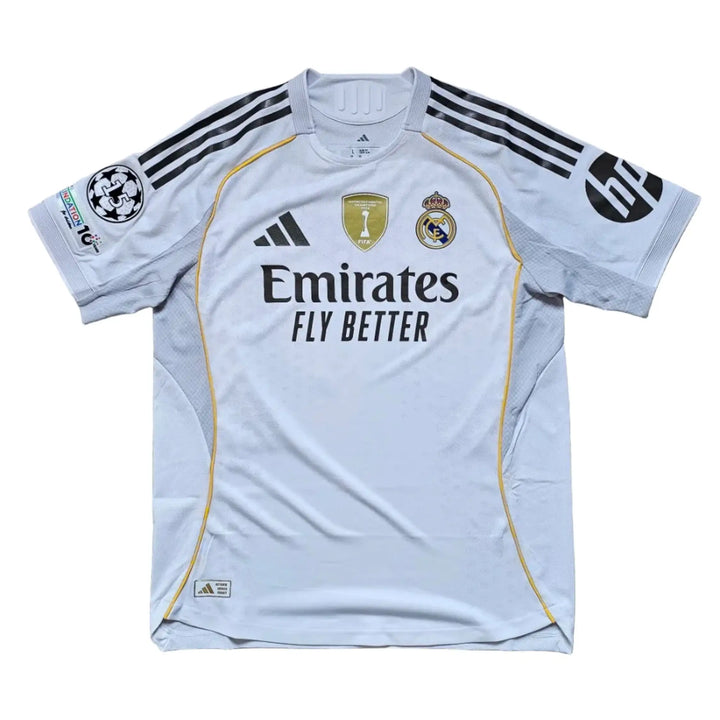 Back view showing adidas logo, UEFA badge, Real Madrid crest, and Emirates sponsor text.