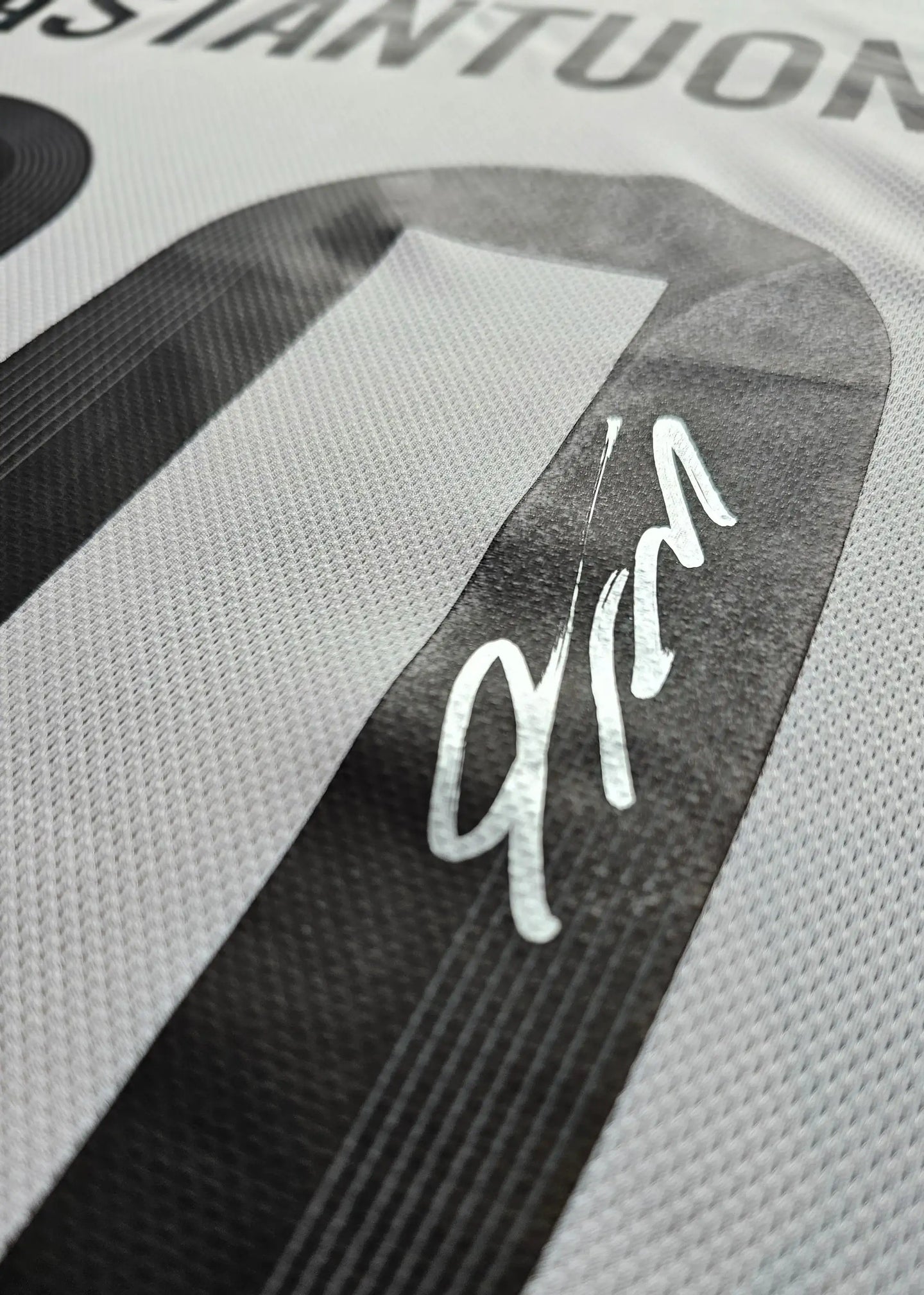 Close-up of the No. 24 and the signature of Franco Mastantuono on a football shirt.