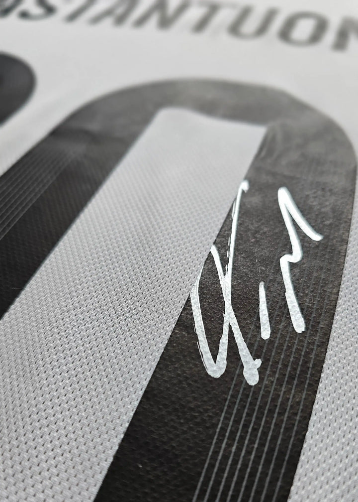 Close-up showing No. 30 and the signature of Mastantuono on the football shirt.
