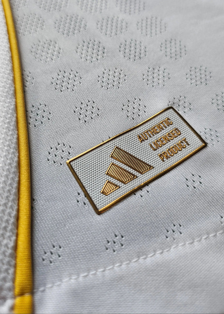 Close-up of the adidas logo with &