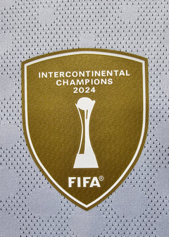 Crest detail featuring Intercontinental Champions 2024 and FIFA logo in gold.