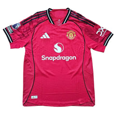 Back view showcasing the Manchester United crest, SnapDragon logo, and red design details.