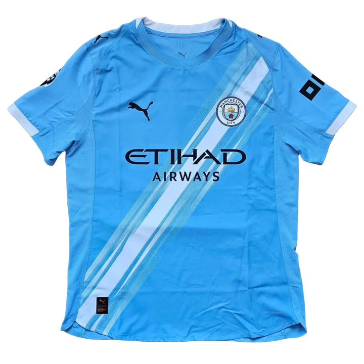 Back view featuring Manchester City crest, Etihad Airways sponsor, and blue color design.