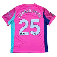 Back view displaying Donnarumma, No. 25, with a visible signature on a pink football shirt.